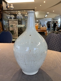 A pale celadon-glazed vase, a jar and a ewer, Asia, 19th C and later