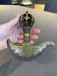 A Tibetan brass and iron kartika with incised dragon design, 19th C.