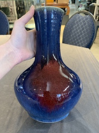 A Chinese flamb&eacute;-glazed bottle vase, 19th C.