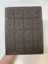 Seven Chinese Pu'er tea and black tea bricks, 20th C.
