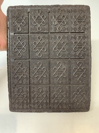 Seven Chinese Pu'er tea and black tea bricks, 20th C.