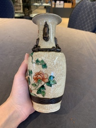 Seven Chinese Nanking blue and white and famille verte crackle-glazed vases, 19/20th C.