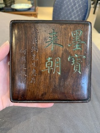 Two Chinese carved bamboo brush pots and an ink stone with wooden cover and stand, signed He Xuanting 何選廷 and Dian Liangbi 典良弼, 19th C.