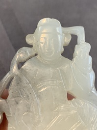 Two Chinese white and celadon jade 'crane' and 'deity' plaques, Qing