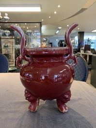 A Chinese flamb&eacute;-glazed tripod censer with 'ruyi' handles, 19th C.