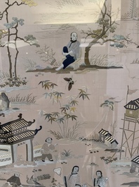 A very large Chinese beige-ground embroidered silk panel depicting scenes of Chinese rural life, 19th C.
