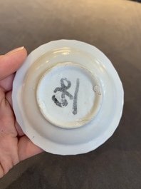 Four Chinese white-glazed saucers and three bowls, Yuan/Ming