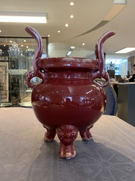 A Chinese flamb&eacute;-glazed tripod censer with 'ruyi' handles, 19th C.