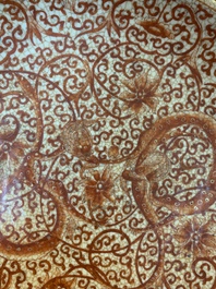 A Chinese iron-red-decorated crackle-glazed  'chilong and lotus scroll' plate, Jiajing mark, 19th C.
