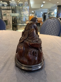 A fine Chinese carved bamboo group with Liuhai on wooden stand, 19th C.