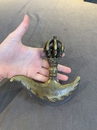 A Tibetan brass and iron kartika with incised dragon design, 19th C.