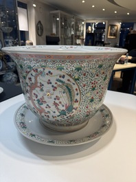 A pair of large Chinese famille rose 'dragon and phoenix' jardini&egrave;res and stands, 20th C.