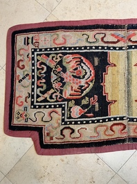 Two Tibetan saddle rugs with dragons and phoenixes, 19th C.