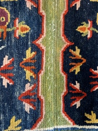 Two Tibetan saddle rugs with dragons and phoenixes, 19th C.