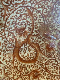 A Chinese iron-red-decorated crackle-glazed  'chilong and lotus scroll' plate, Jiajing mark, 19th C.