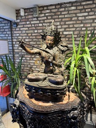 A very large Nepalese bronze sculpture of Manjusri, 19/20th C.