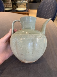 A pale celadon-glazed vase, a jar and a ewer, Asia, 19th C and later