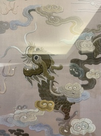 A very large Chinese beige-ground embroidered silk panel depicting scenes of Chinese rural life, 19th C.