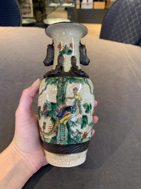 Seven Chinese Nanking blue and white and famille verte crackle-glazed vases, 19/20th C.