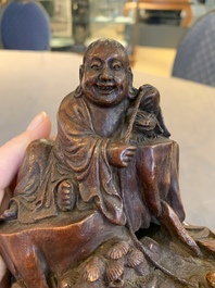 A fine Chinese carved bamboo group with Liuhai on wooden stand, 19th C.