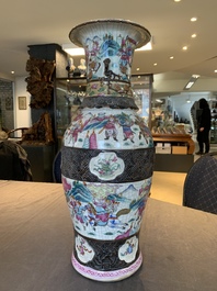 A pair of Chinese Nanking famille rose vases with narrative design, 19th C.