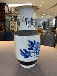 Seven Chinese Nanking blue and white and famille verte crackle-glazed vases, 19/20th C.