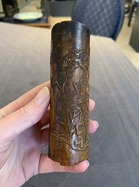 Two Chinese carved bamboo brush pots and an ink stone with wooden cover and stand, signed He Xuanting 何選廷 and Dian Liangbi 典良弼, 19th C.