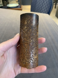 Two Chinese carved bamboo brush pots and an ink stone with wooden cover and stand, signed He Xuanting 何選廷 and Dian Liangbi 典良弼, 19th C.