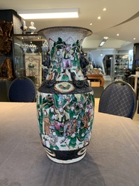 Seven Chinese Nanking blue and white and famille verte crackle-glazed vases, 19/20th C.