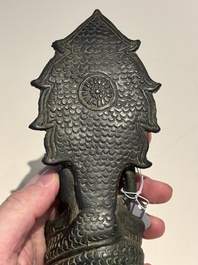 A Khmer bronze figure of Buddha Mucilinda, Angkor period, 12/13th C.