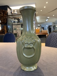A Chinese teadust-glazed 'hu' vase with 'taotie' design, 19/20th C.