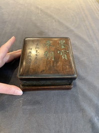 Two Chinese carved bamboo brush pots and an ink stone with wooden cover and stand, signed He Xuanting 何選廷 and Dian Liangbi 典良弼, 19th C.
