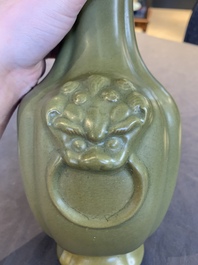 A Chinese teadust-glazed 'hu' vase with 'taotie' design, 19/20th C.