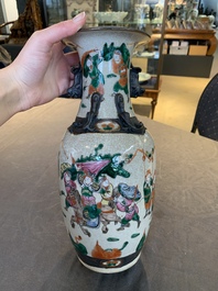 Seven Chinese Nanking blue and white and famille verte crackle-glazed vases, 19/20th C.