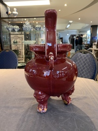 A Chinese flamb&eacute;-glazed tripod censer with 'ruyi' handles, 19th C.