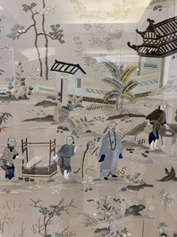A very large Chinese beige-ground embroidered silk panel depicting scenes of Chinese rural life, 19th C.