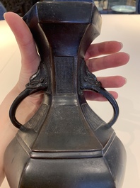 A Chinese archaistic bronze vase and three Japanese bronze vases, 14/18th C.