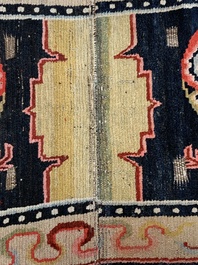 Two Tibetan saddle rugs with dragons and phoenixes, 19th C.