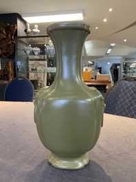 A Chinese teadust-glazed 'hu' vase with 'taotie' design, 19/20th C.