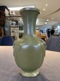 A Chinese teadust-glazed 'hu' vase with 'taotie' design, 19/20th C.