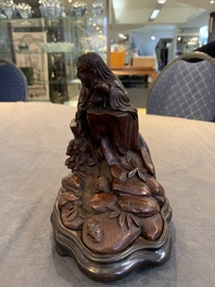 A fine Chinese carved bamboo group with Liuhai on wooden stand, 19th C.