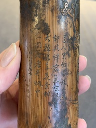 Two Chinese carved bamboo brush pots and an ink stone with wooden cover and stand, signed He Xuanting 何選廷 and Dian Liangbi 典良弼, 19th C.