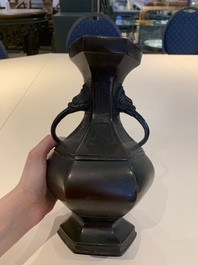 A Chinese archaistic bronze vase and three Japanese bronze vases, 14/18th C.