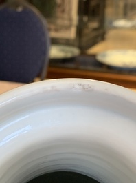 A Chinese blue and white 'flower scrolls' rouleau vase, Kangxi