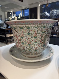 A pair of large Chinese famille rose 'dragon and phoenix' jardini&egrave;res and stands, 20th C.