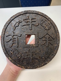 Seven Chinese Pu'er tea and black tea bricks, 20th C.