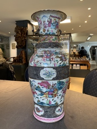 A pair of Chinese Nanking famille rose vases with narrative design, 19th C.
