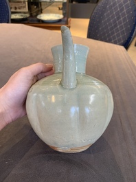 A pale celadon-glazed vase, a jar and a ewer, Asia, 19th C and later