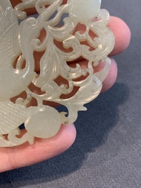 Two Chinese white and celadon jade 'crane' and 'deity' plaques, Qing