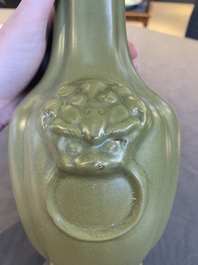 A Chinese teadust-glazed 'hu' vase with 'taotie' design, 19/20th C.